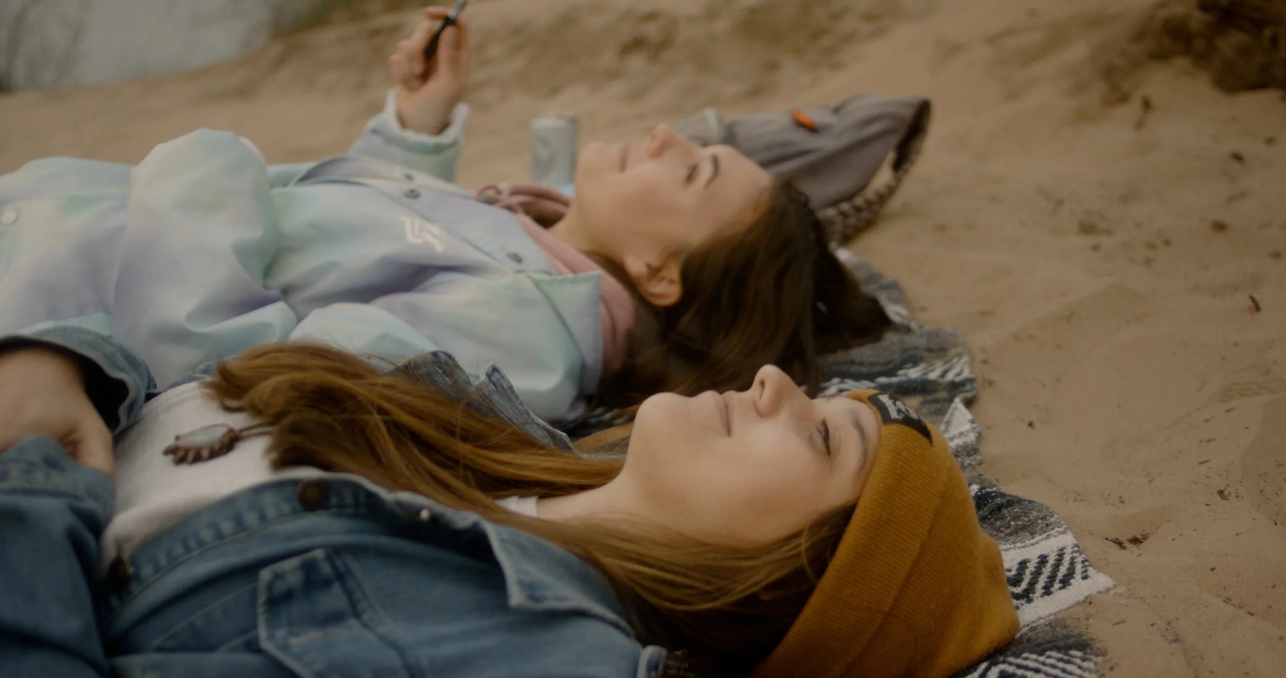 Friends sharing a moment on the Michigan shoreline